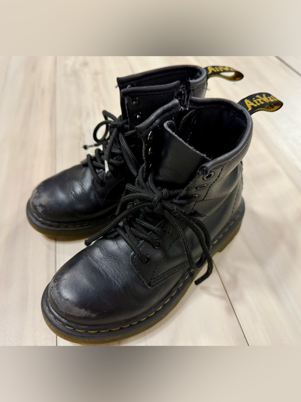 Dr. Martens Kids Black Lace-Up Ankle Boots with Yellow Stitching